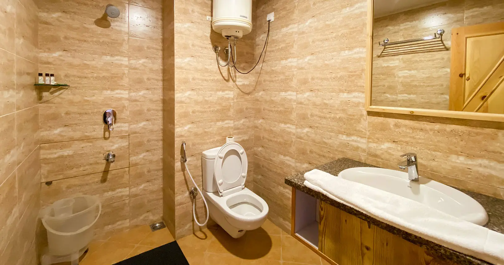 Washroom in the deluxe room at Hotel Batseri, Sangla.